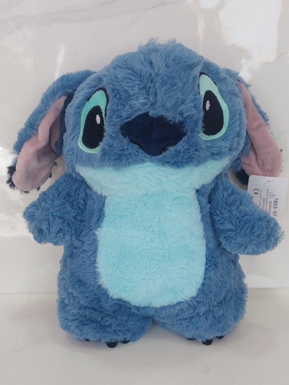 عروسک استیج یه عروسک بغلی وکیسه آب گرم داربرای تسکین درد پریود